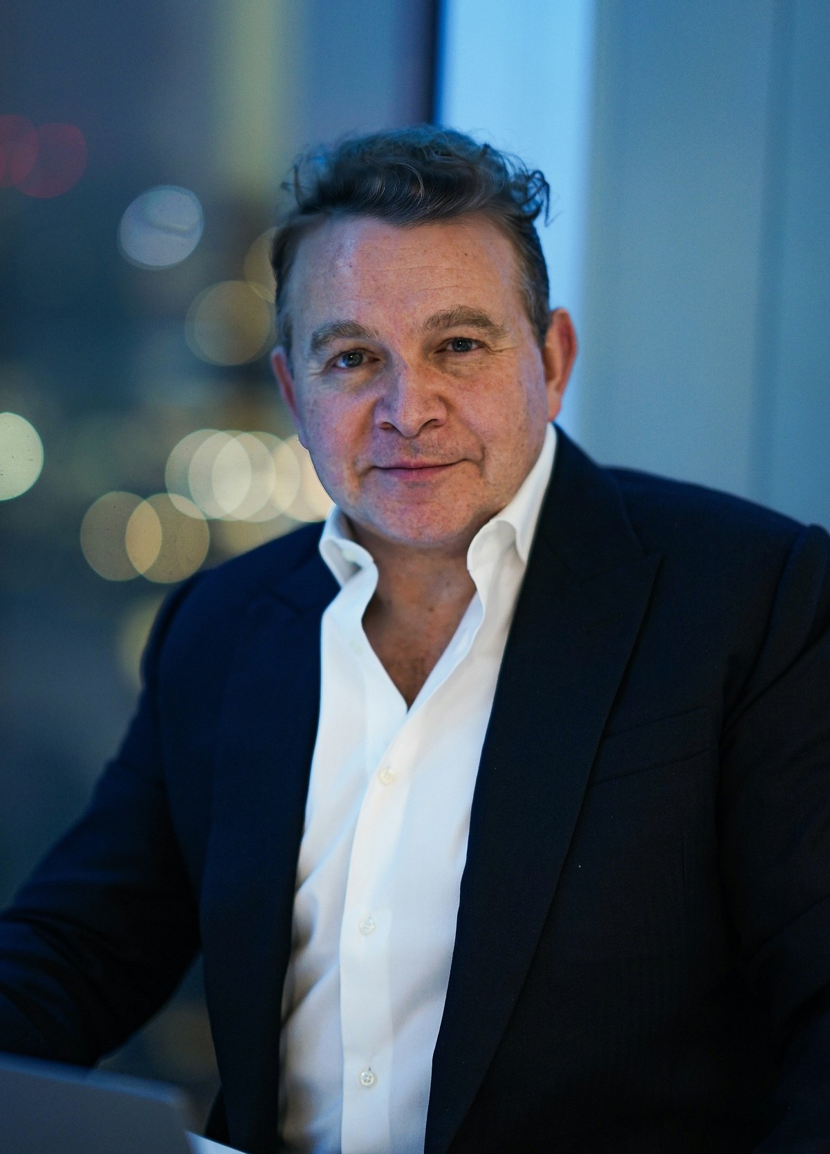 Senior commercial advisor in a tailored suit